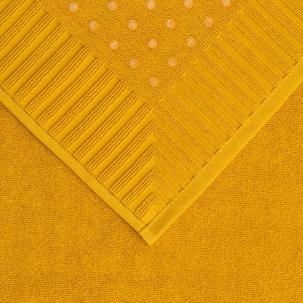 Коврик для ванной с фактурным бортиком цвета охры из коллекции essential, 50х80 см Tkano