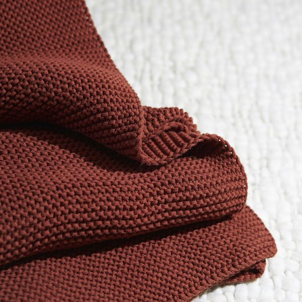 Плед из хлопка жемчужной вязки терракотового цвета из коллекции essential, 130х180 см Tkano