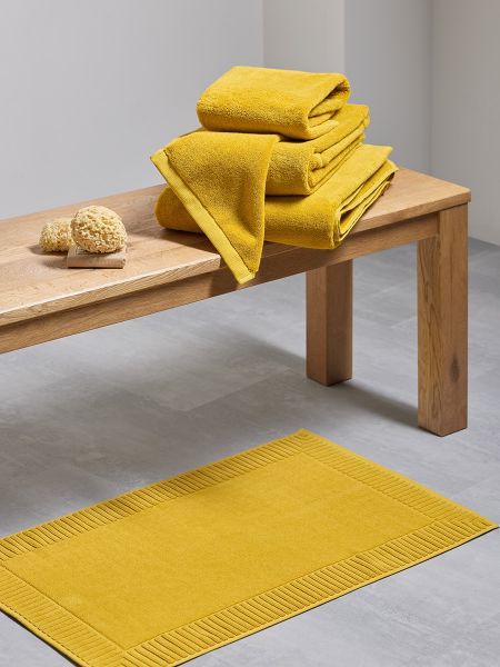 Коврик для ванной с фактурным бортиком цвета охры из коллекции essential, 50х80 см Tkano