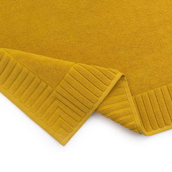 Коврик для ванной с фактурным бортиком цвета охры из коллекции essential, 50х80 см Tkano